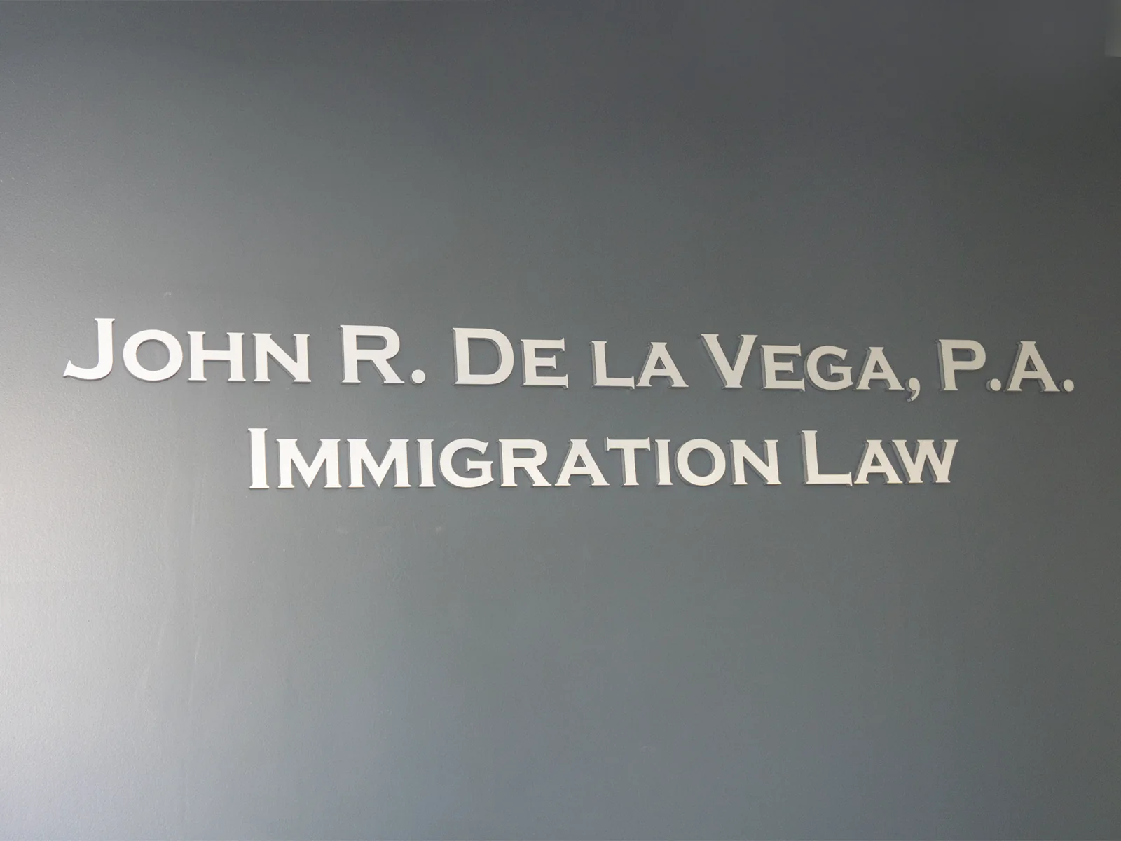 De La Vega Law interior office sign in Miami